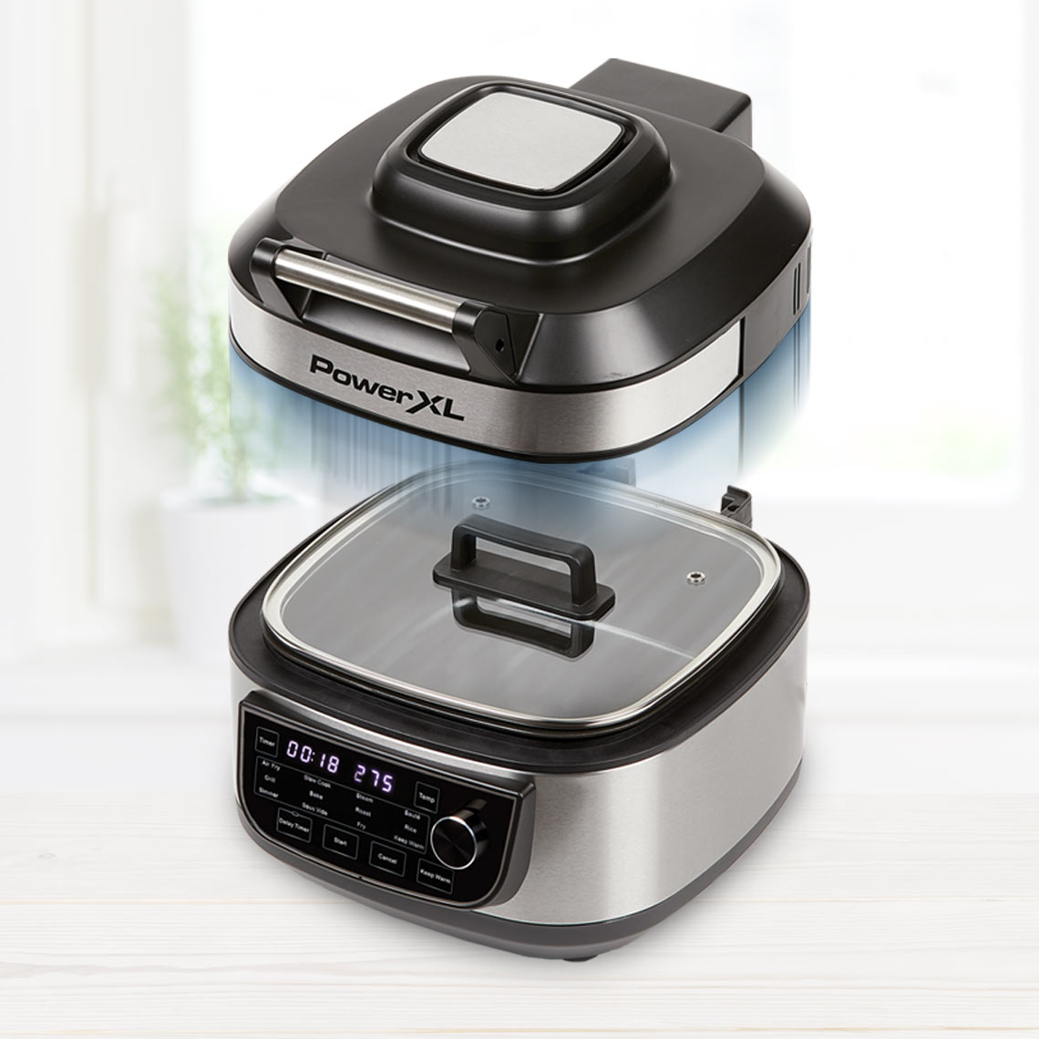 PowerXL Multi Cooker mit abnehmbarem Heißluftdeckel und Glasdeckel – für vielseitiges Kochen und Braten.