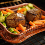 Steak und Gemüse werden im Livington Super Crisper im Ofen knusprig und fettarm gegart.