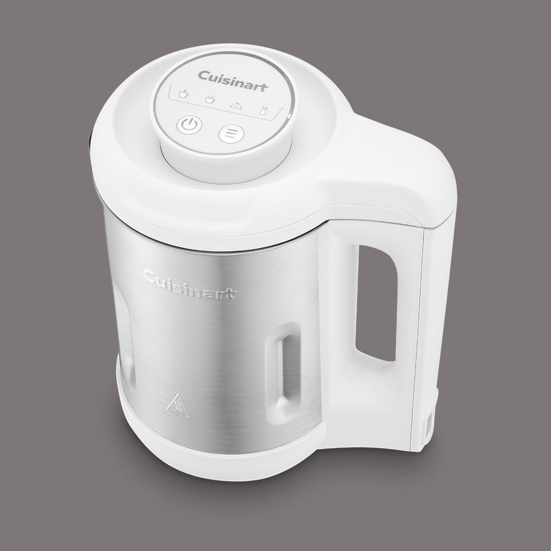 Kompakter Cuisinart NutSmart Milchbereiter aus Edelstahl und Weiß im modernen Design.