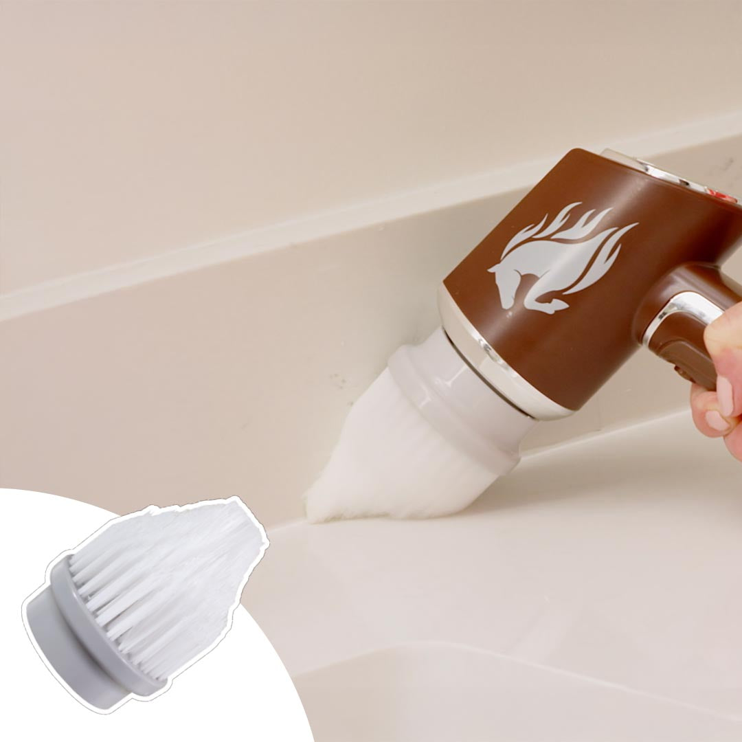 Handbürste mit spitzem weißen Aufsatz reinigt präzise eine Ecke, unten eingeblendet Ersatzaufsatz.